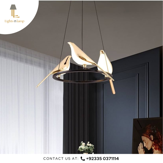 Modern pendant light fixture with gold accents in a room setting.