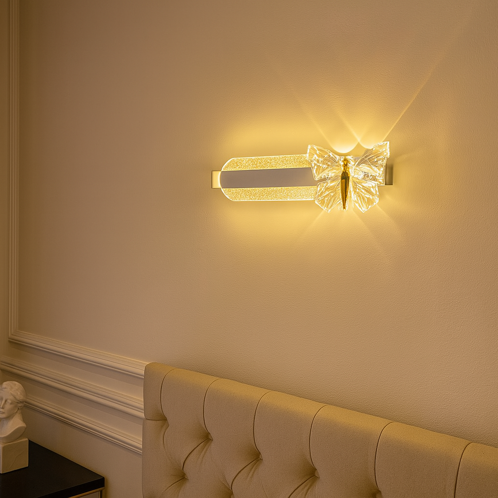 Decorative wall sconce on a wall with a curtain and headboard in the background