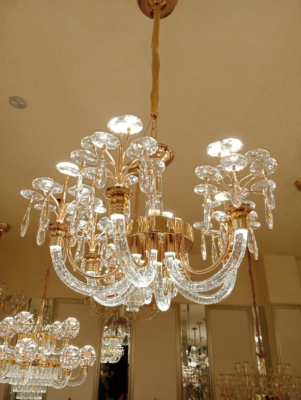 Luxurious chandelier with crystal elements in a room setting