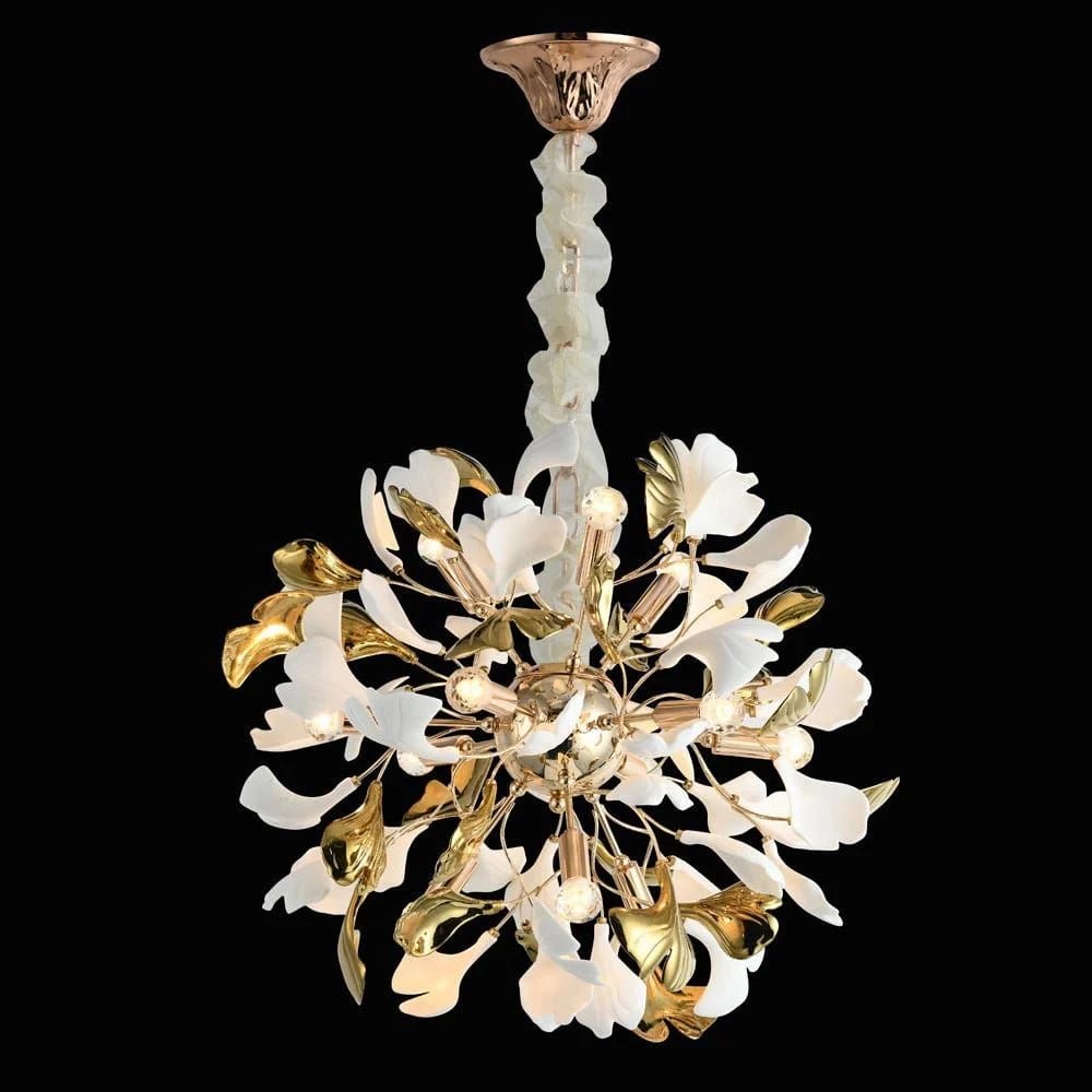 Decorative chandelier with gold and white elements on a black background