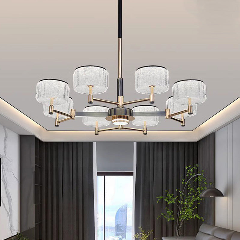 Modern chandelier in a living room setting with neutral colors and decor.
