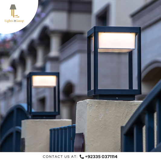 Modern outdoor lamp post on a building exterior with 'Lights n Lamp' branding.