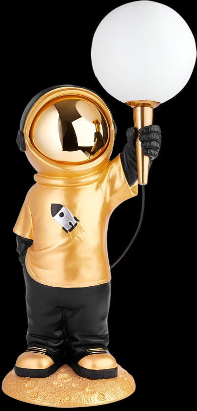Gold astronaut figurine holding a light bulb on a white background