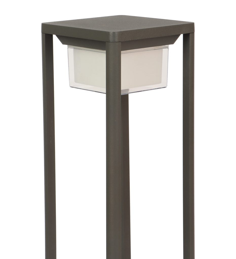 Tall outdoor lamp with rectangular glass shade on a white background