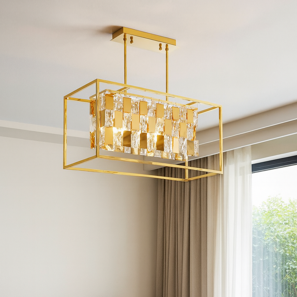 Modern living room with a gold pendant light fixture, beige sofa, and marble coffee table.