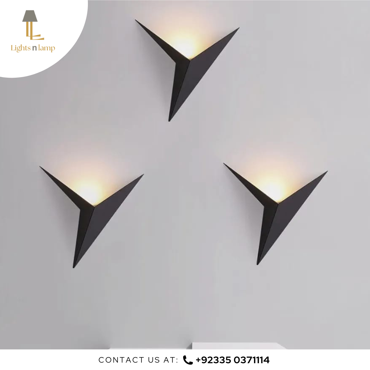 Three modern black wall lights on a gray wall with 'Lights n Lamp' branding.