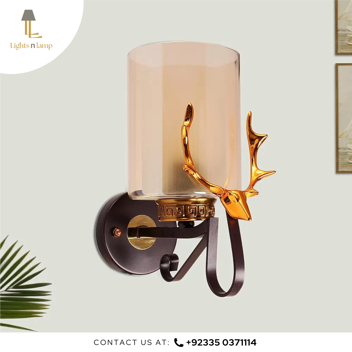 Wall-mounted lamp with deer antler design on a light gray background