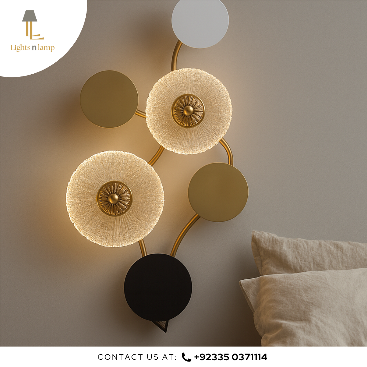 Modern wall lamp with decorative design on a neutral wall.