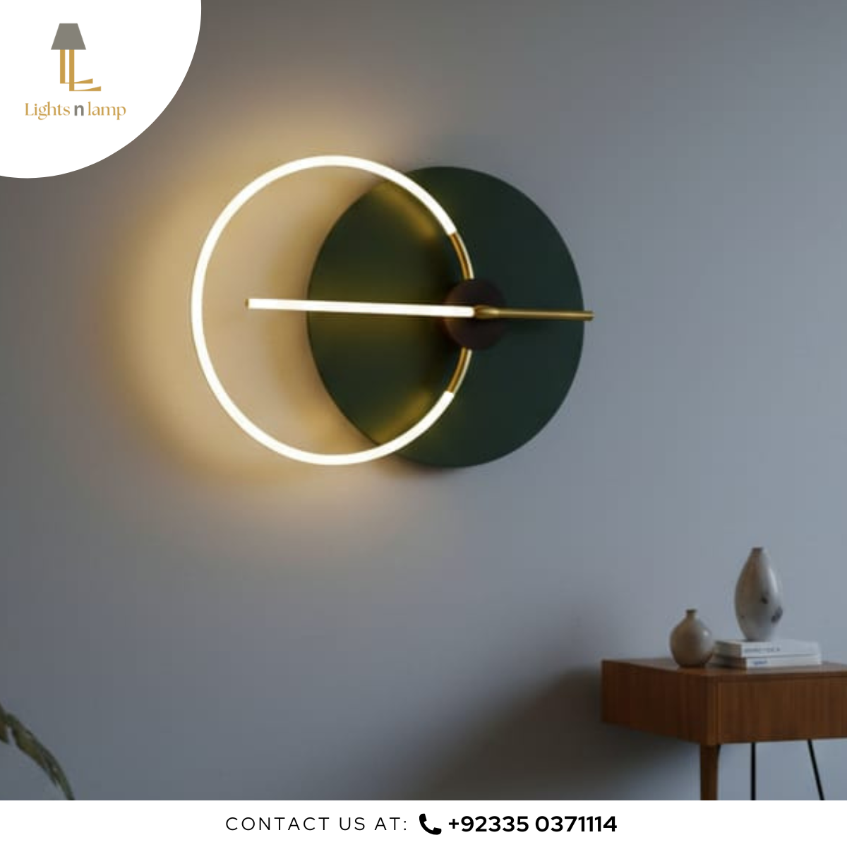 Modern wall light fixture with a minimalist design on a gray wall, featuring the brand 'Lights n Lamp'.