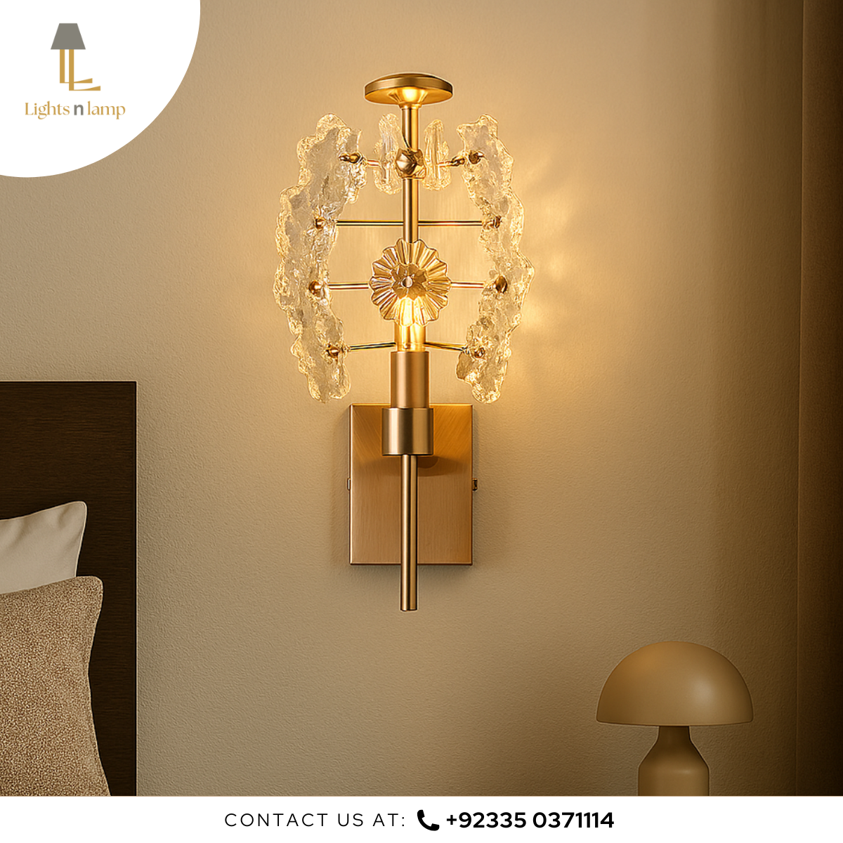 Decorative wall sconce with crystal accents on a wall near a bed.