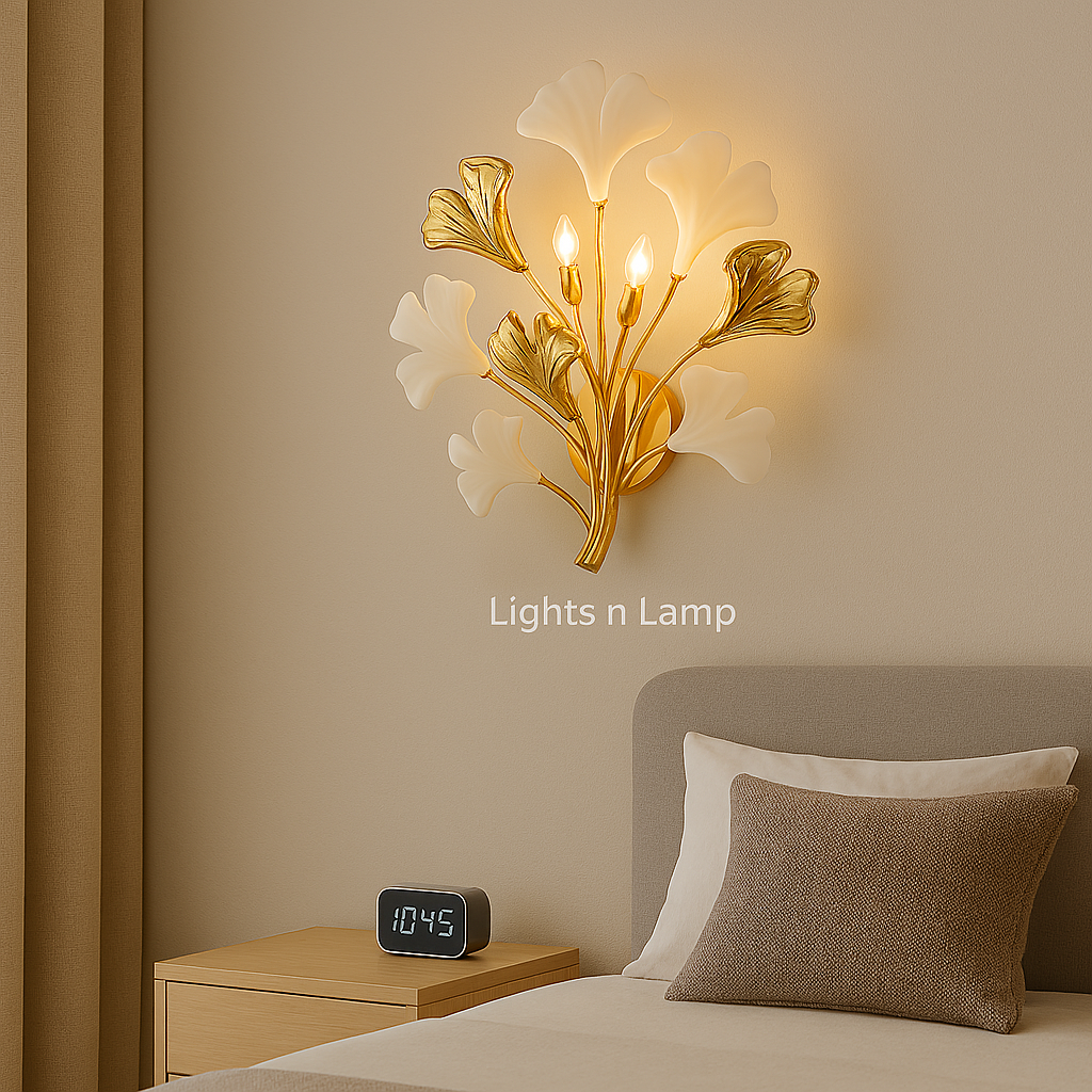 Decorative wall lamp with floral design on a beige wall above a bed.