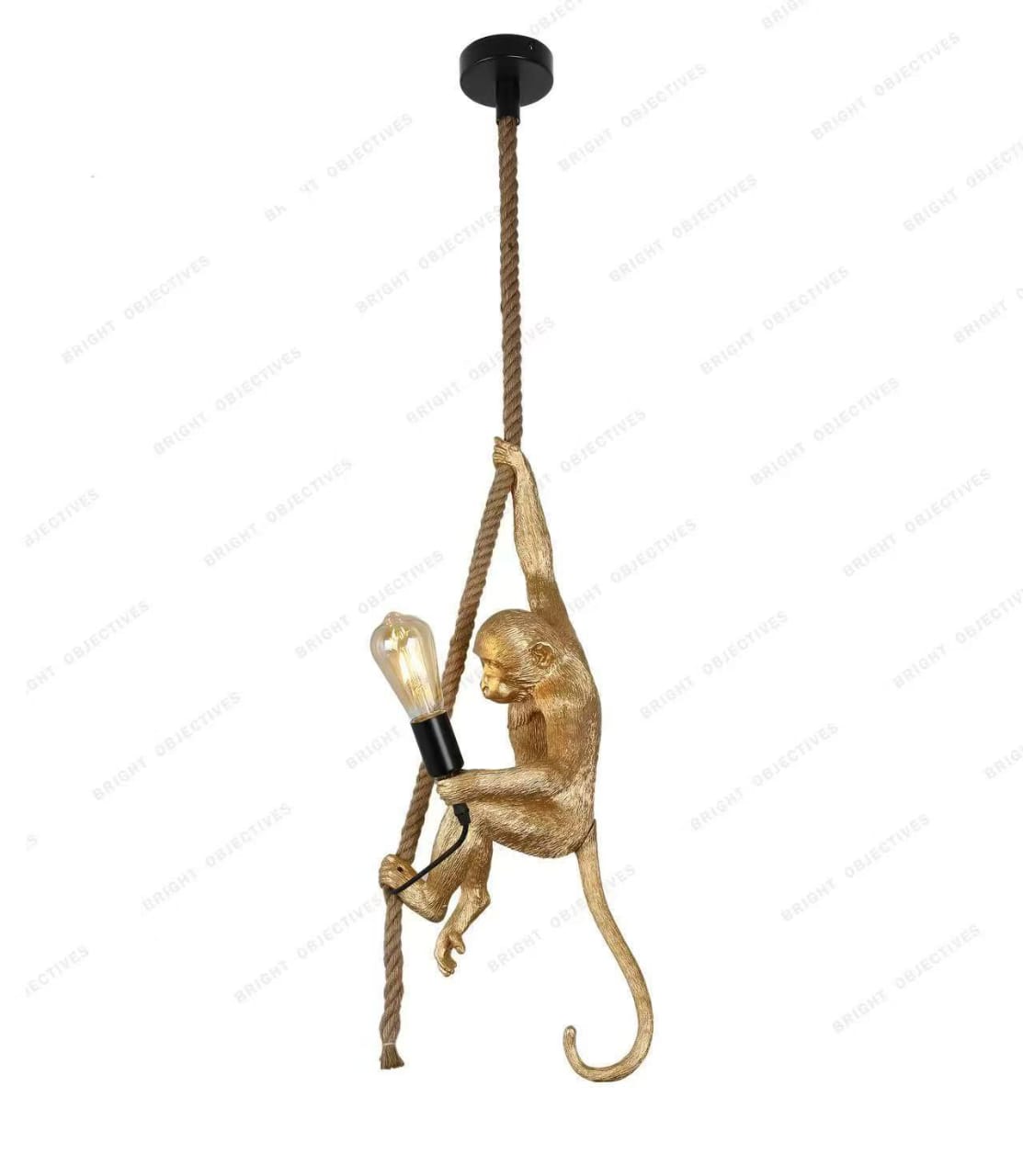 Gold monkey pendant light hanging from a rope on a white background